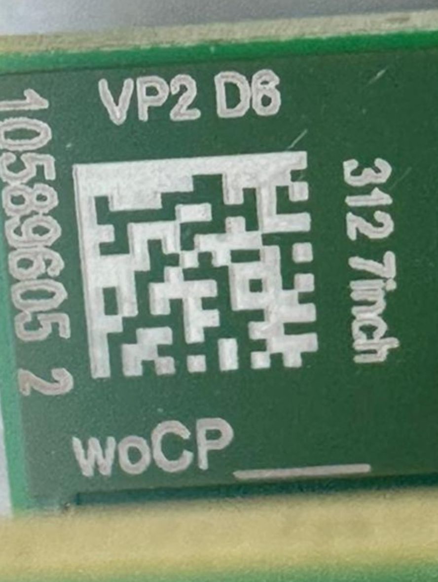 Close-up of the Data Matrix code on a Continental VP2 312 motherboard, marked VP2 D6 and 312 7inch